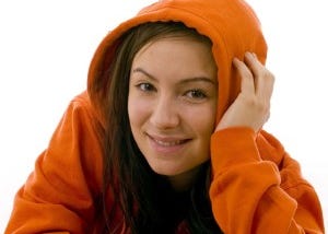 Girl wearing an orange hoodie