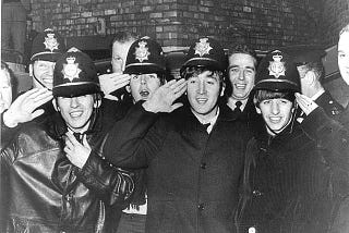 The Beatles with Birmigham police officers
