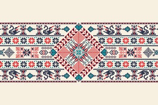 A red, turquoise, and black patterned Tatreez image — an embroidery that is uniquely Palestinian