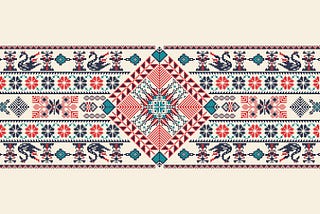 A red, turquoise, and black patterned Tatreez image — an embroidery that is uniquely Palestinian