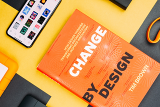 An image of a book named Change by Design