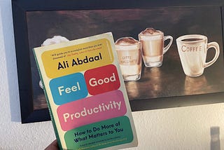 Feel Good Productivity Book in front of my coffee table