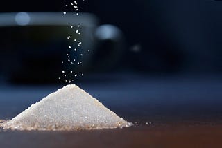 Small pile of white granulated sugar