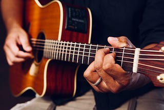 Man playing the guitar