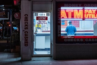 Photo by Alexandros Chatzidimos: https://www.pexels.com/photo/atm-booth-with-neon-signage-3652781/