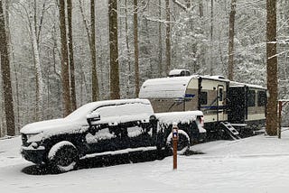 RV and pickup truck snow trip to the mountains by Teekay Rezeau-Merah