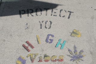 Sidewalk art “protect yo high vibes”