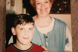 An old photo of a woman and her grandson