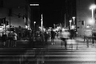 People walking on zebra crossing.