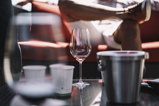 wine glass on table as part of daily ritual