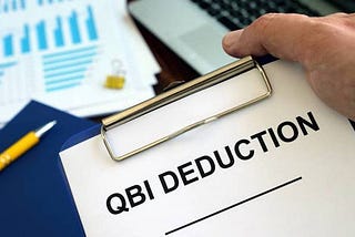 What are the limitations on the QBI deduction for high-income earners