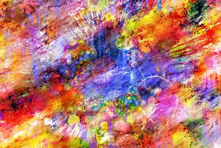 Abstract image of colours splashed around, merging and overlapping following no clear pattern