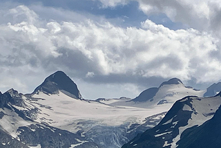 Icy, snow-covered mountains.