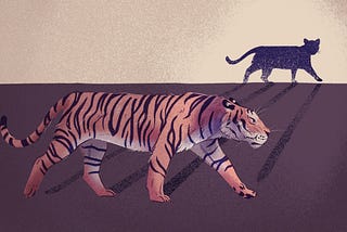 An illustration of a tiger with a cat shadow in the background. The color palette is in pinks and blues. The tiger’s stripes show a hidden ‘UX’.