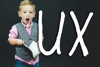 Child with a “UX” written next to him.