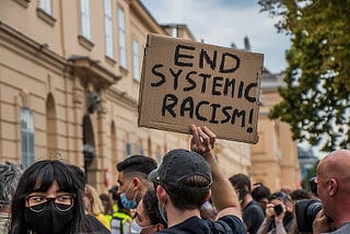 The Burden of Proof of Systemic Racism