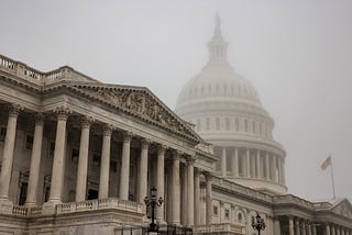 Thick fog envelopes the U.S. Capitol dome behind the U.S. House of Representatives on 4 November 2022 in Washington, DC. Photo by Samuel Corum/Getty Images