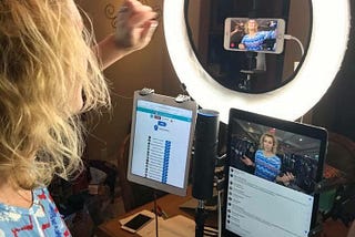 Influencer recording live video to her followers