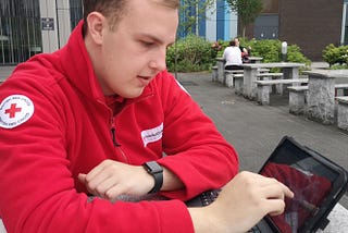 Service Coordinator using tablet outside of a hospital