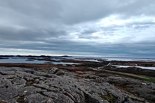 Nature with mountains and a dark sky, image from above