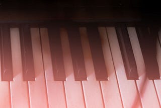 Pink hued piano keys