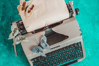 Butterflies on a Vintage Typewriter
