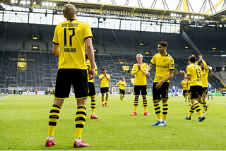Erling Haaland’s ‘socially distanced’ celebration in Dortmund’s 4–0 win over Schalke as Bundesliga restarts