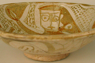 Image of Imported Luster Bowl — Earthenware; luster-painted on an opaque white glaze via WikiMedia