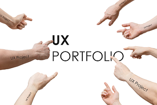 Fingers pointing to the words UX Portfolio.