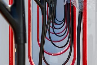 IMAGE: A row of Tesla superchargers