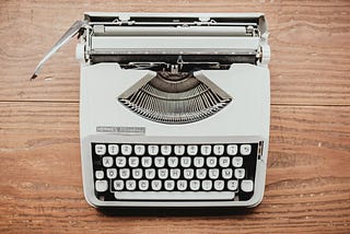 White typewriter via Unsplash