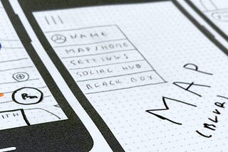 Divider image showing paper wireframes