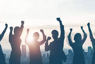 Group of people rejoicing over their successes