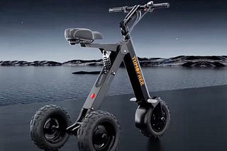 An angled look at the K7 Pro Electric trike with water in the background.