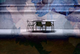 a dark image of a table with 3 chairs with an overlay of flowers.