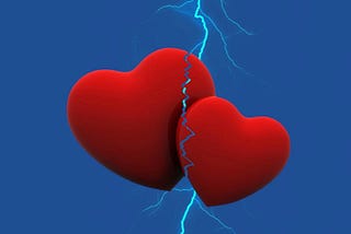 Two red hearts, broken by one single lightening bolt.