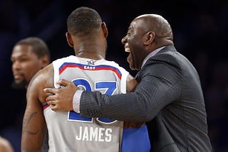 LeBron James and Magic Johnson exchanging a laugh on All-Star weekend