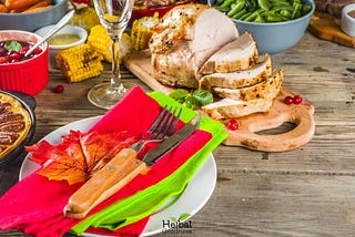 A dinner table thanksgiving spread with yummy organic meals set out