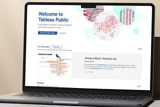 A laptop that shows a rendering of Tableau Public’s home page.