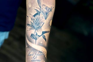 Lilies blooming on my hand