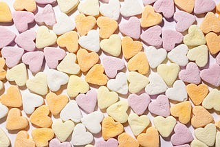 Close up bunch of candied hearts