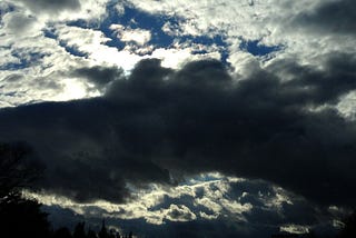 Luminous fish cloud-surfing under dark cloud bridge (Photo by the author, 2016).