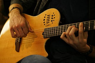 Playing guitar