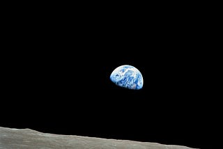 An image of the “pale blue dot” of Earth, as seen from the lunar surface.