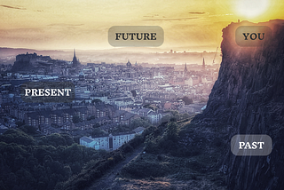 A photo shows the Edinburgh landscape, the high Salisbury Crags on the right, the city below left, and the hills on the horizon. a Person stans atop the crags. This is you, surveying the past, present, and future all at once.
