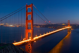 San Francisco’s Golden Gate Bridge, lit up at dusk