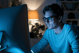 Man on a laptop at night — My AI workflow is breaking profit records again