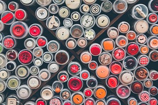 Assortment of multi-colored clothing buttons