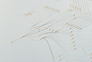 Connected threads and pill shaped connection points, representing data and decision paths
