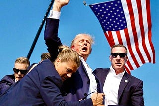 Trump, fist high after attempted assassination